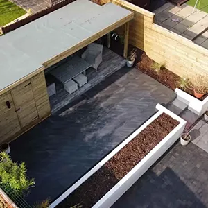 an aerial view of a house with a pool