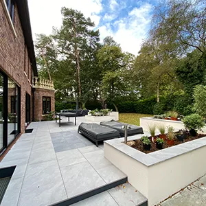 a patio area with a couch and a table